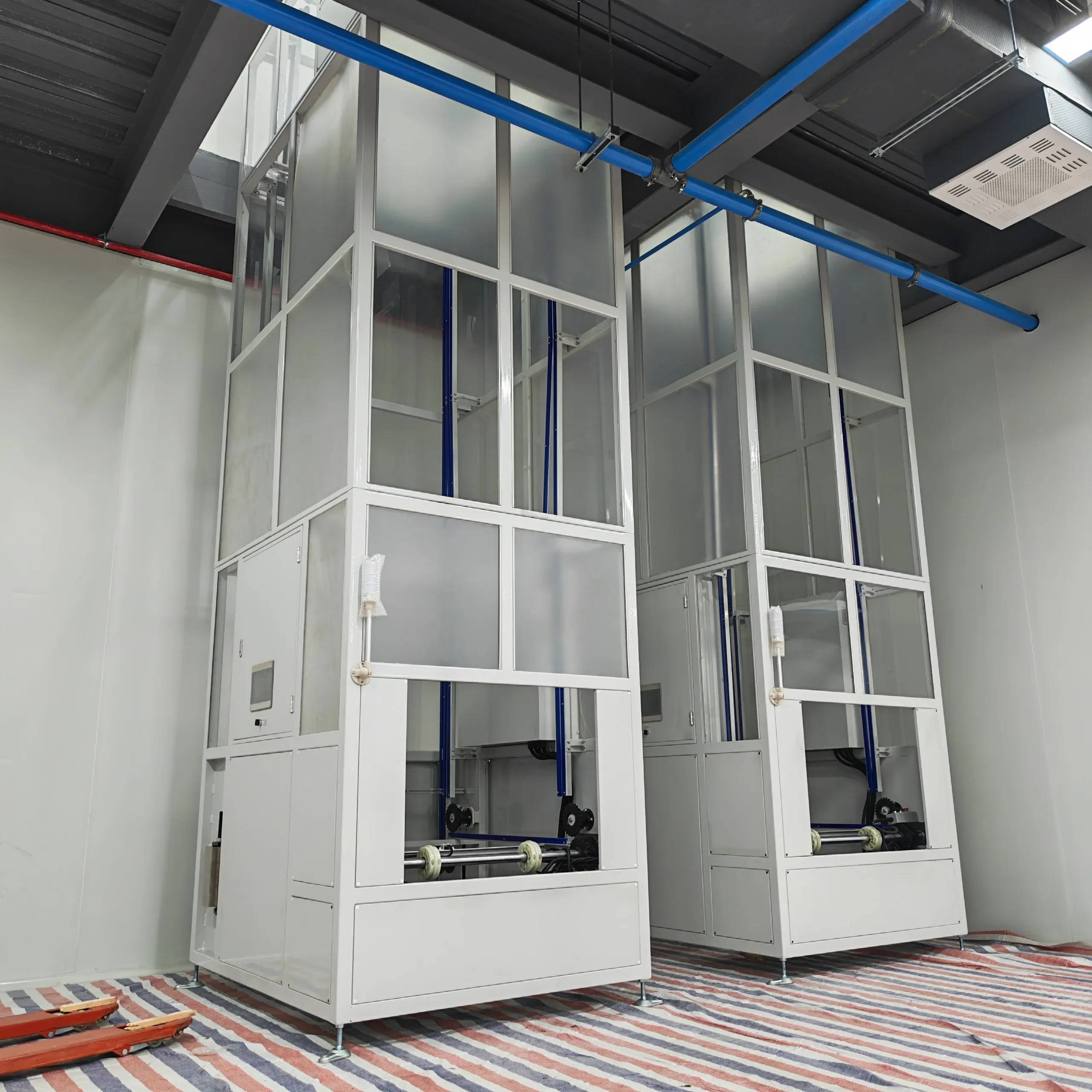 Outdoor Continuous Vertical Conveyor | Fully-Enclosed Steel Structure for All-Weather Operation